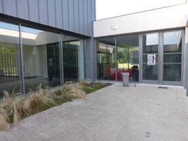 Entrée de la salle Entrée de la salle
